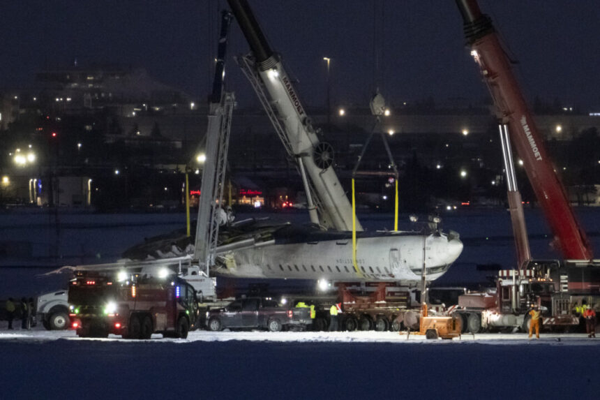 crashed-delta-jet-cleared-from-toronto-airport-runway,-all-21-injured-out-of-hospital