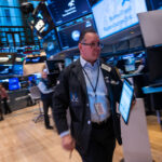 stocks-end-volatile-week-mixed-on-tariffs,-stagflation-concerns,-tech-earnings