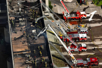 day-in-photos:-fire-at-carabineros-academy,-israeli-military-demolishes-homes,-and-brazil-carnival