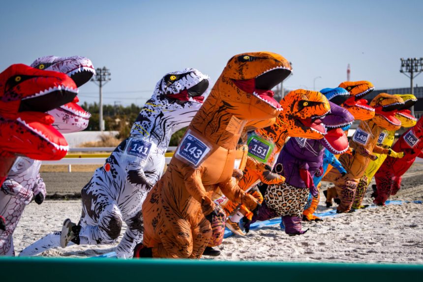 day-in-photos:-tyrannosaurus-race,-protests-in-germany,-and-british-gymnastics-championships