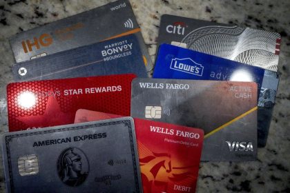 tempted-by-rewards,-americans-increasingly-trapped-in-credit-card-debt,-survey-finds