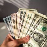 dollar-index-falls-below-103,-hits-6-month-low