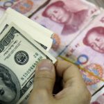 countering-us-tariff-hikes,-yuan-exchange-rate-falls-below-7.4