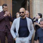 andrew-tate-accused-of-pointing-gun-in-woman’s-face,-court-documents-say