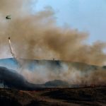 day-in-photos:-forest-fire-in-scotland,-dust-storm-in-iraq,-and-high-security-prison
