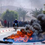 day-in-photos:-protests-in-tunisia,-nepali-new-year,-and-easter-gifts-for-animals