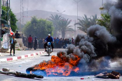 day-in-photos:-protests-in-tunisia,-nepali-new-year,-and-easter-gifts-for-animals