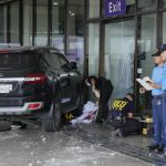 vehicle-crashes-into-entrance-at-manila-airport,-killing-2-people-including-young-girl