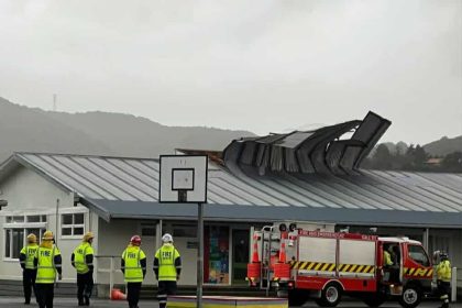 new-zealand-lashed-by-storms,-roof-blown-across-suburb