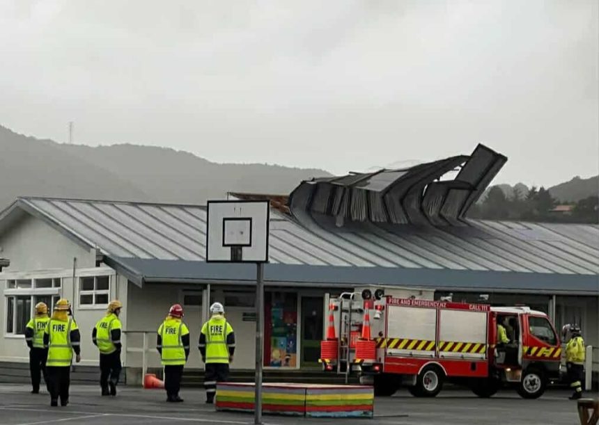 new-zealand-lashed-by-storms,-roof-blown-across-suburb
