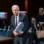 federal-reserve-keeps-interest-rates-unchanged,-signals-2-cuts-this-year
