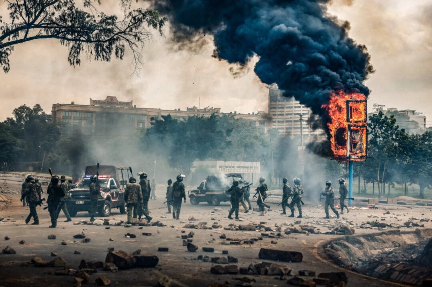 day-in-photos:-protests-in-kenya,-astronauts-fly-to-iss,-and-uk’s-largest-music-festival