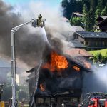 day-in-photos:-fire-in-switzerland,-armed-forces-day,-and-protests-in-thailand