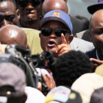 south-africa’s-ramaphosa-suspends-police-minister-over-criminal-link-allegations