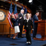 day-in-photos:-gop-press-conference,-flood-in-the-philippines,-and-fishing-cat