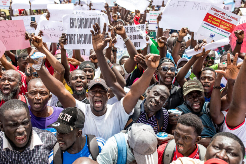 day-in-photos:-protests-in-gambia,-detention-of-illegal-immigrant,-and-peace-talks-between-ukraine-and-russia
