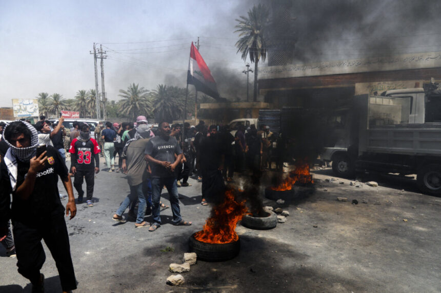 day-in-photos:-water-shortage-in-iraq,-typhoon-co-may,-and-heatwave-in-south-korea