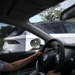 china’s-baidu-to-deploy-its-self-driving-taxis-globally-through-deals-with-lyft,-uber