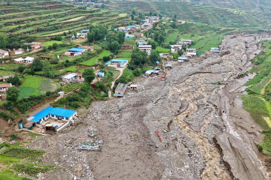 china-flash-floods-kill-at-least-10-people-in-gansu-province,-33-missing china-flash-floods-kill-at-least-10-people-in-gansu-province,-33-missing