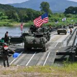 day-in-photos:-us–south-korean-military-exercise,-church-shooting,-flood-in-india