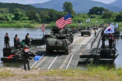 day-in-photos:-us–south-korean-military-exercise,-church-shooting,-flood-in-india