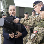 carney-extends-military-mission-in-latvia,-calls-it-key-to-‘deterring-russian-aggression’