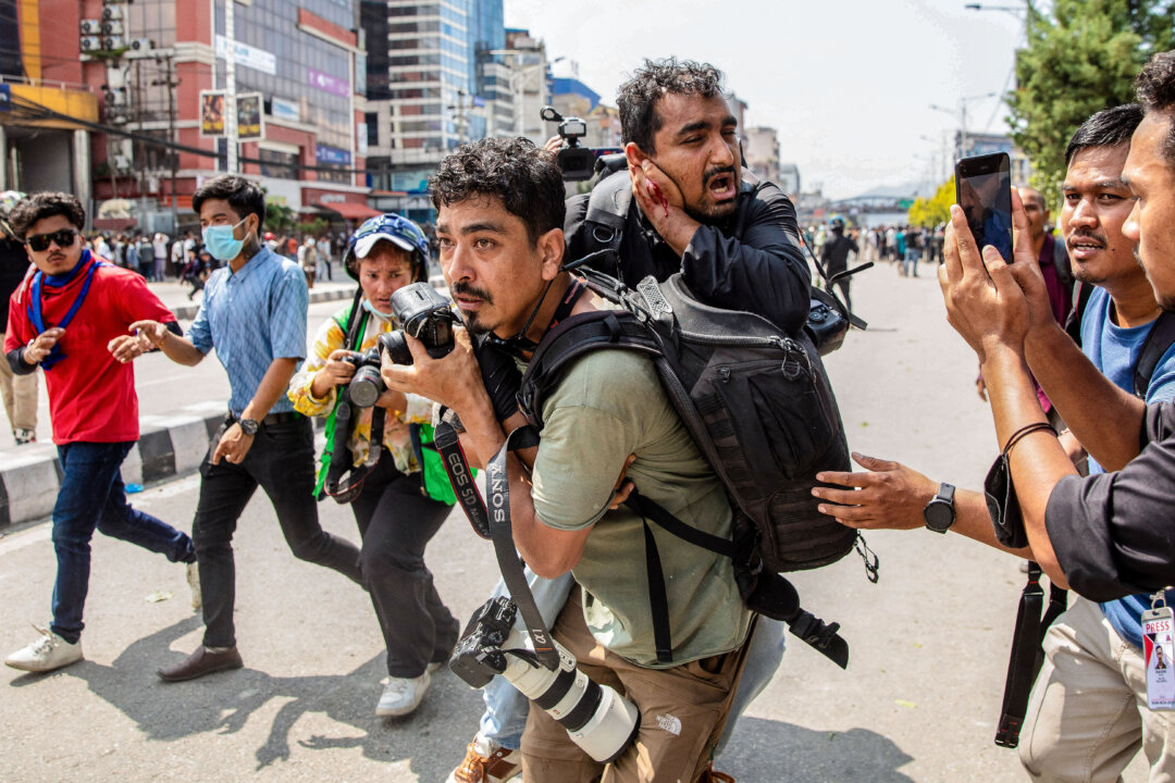 day-in-photos:-protests-in-nepal,-shooting-in-jerusalem,-and-total-lunar-eclipse