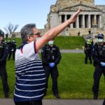 queensland-man-charged-over-nazi-salute-at-football-match