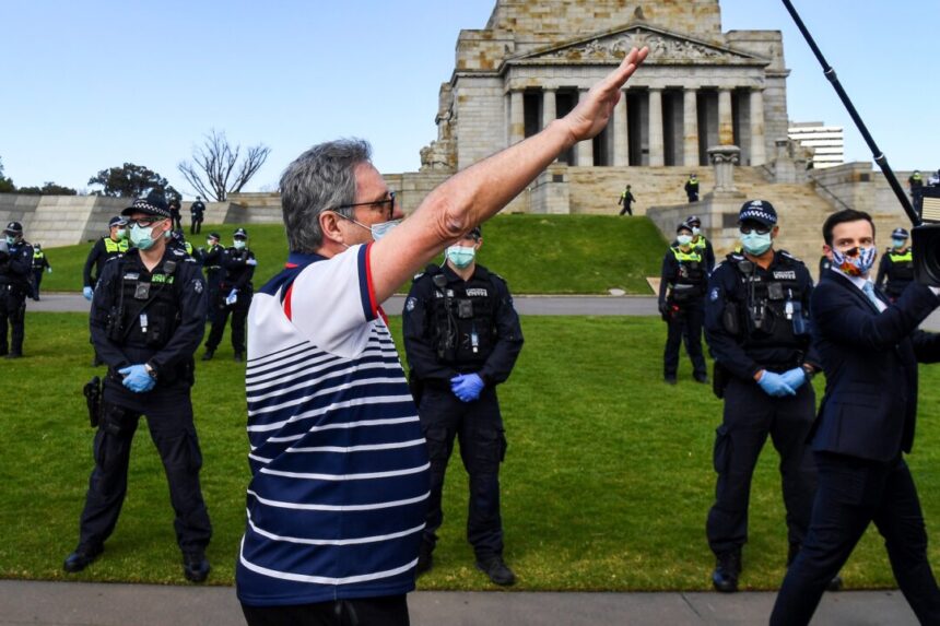 queensland-man-charged-over-nazi-salute-at-football-match