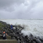 super-typhoon-blowing-by-northern-philippines-and-taiwan-forces-evacuations-and-closures