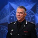 victoria-police-chief-apologises-for-using-official-chopper-to-attend-conference