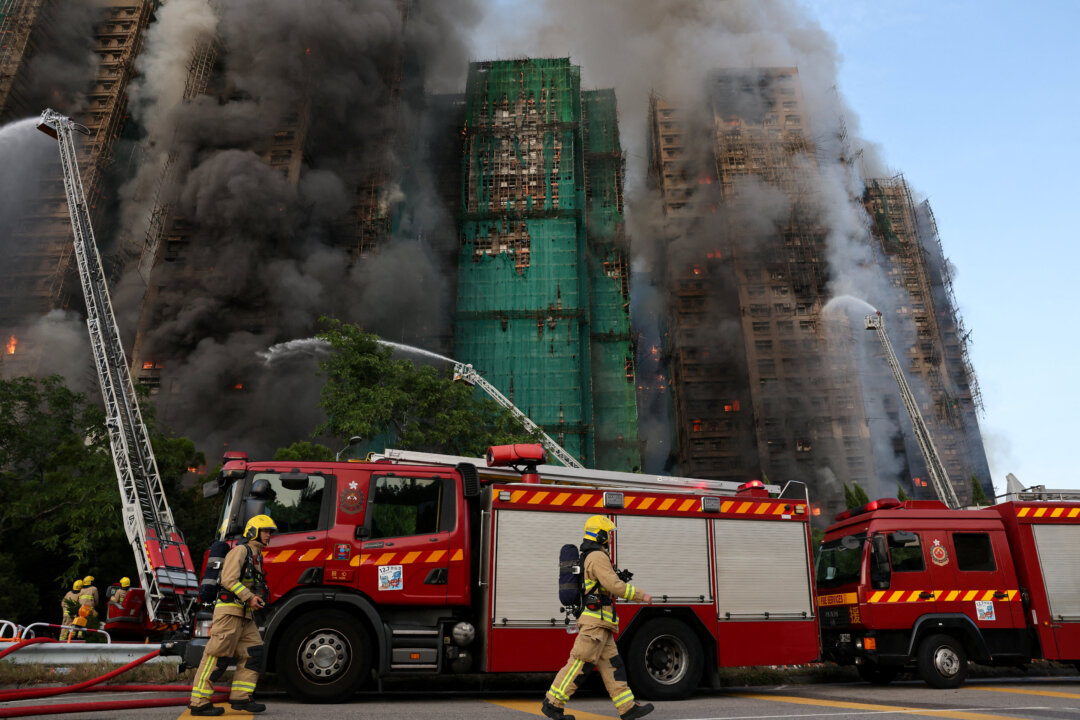 hong-kong-diaspora-demands-answers-after-deadly-high-rise-fire