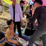 rescuers-free-4-men-who-had-been-trapped-in-a-flooded-laos-cave,-search-for-2-still-missing