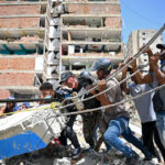 day-in-photos:-earthquake-in-venezuela,-heatwave-in-europe,-protests-in-indonesia
