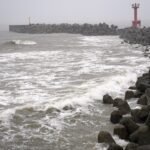 2-tropical-storms-pound-japan-with-floods-and-landslides,-killing-1