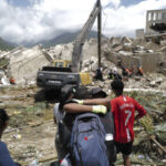 day-in-photos:-venezuela-rescue-effort,-veterans-day-tribute,-and-camel-cup-in-australia