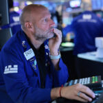 wall-street-review:-dow-hits-new-record-amid-ongoing-market-rotation