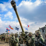 macron-urges-joint-arms-projects-in-europe,-says-go-it-alone-strategies-absurd