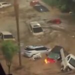 flash-floods-sweep-away-cars,-cut-roads-to-villages-in-northern-china